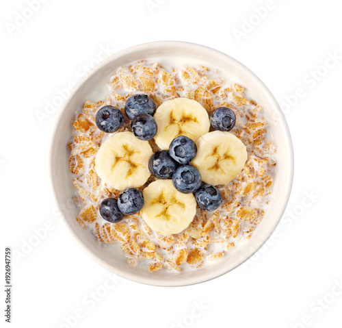 Cereal bowl with milk, banana slices, and blueberries