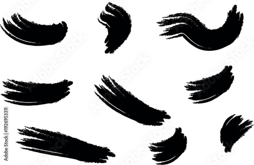 Collection of black brush strokes on white background for artistic and design purposes