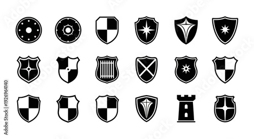 Collection of black and white shield icons with various designs and symbols on a plain background