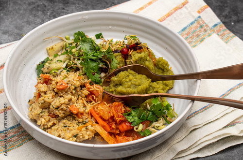Indian vegan rice, lentil and vegetable curry bowl