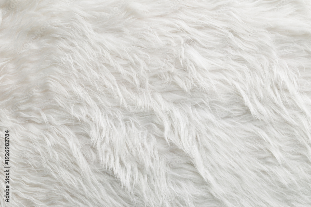Fototapeta premium Soft white texture with long fibers covering a surface during daytime in a bright room