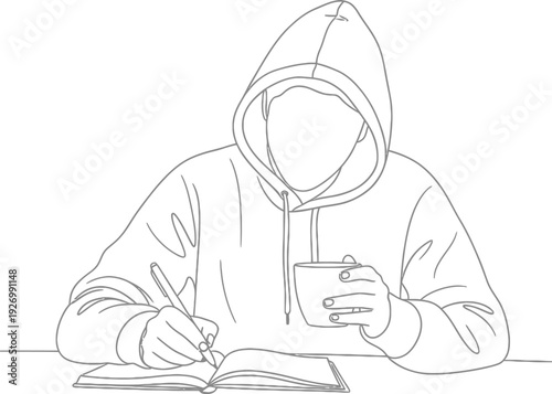 A person wearing a hoodie sitting at a table with their head down