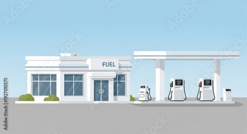 Modern gas station with fuel pumps and a convenience store under a bright sky.