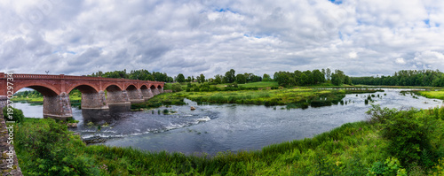 Old brick bridge over Venta river in Kuldiga, Latvia