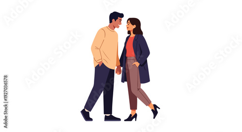 A man and woman walk side by side facing each other in a casual outdoor setting.