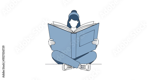 A person sits cross-legged reading a large book.