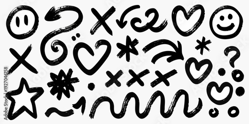 Hand drawn doodles of hearts stars faces and various abstract symbols