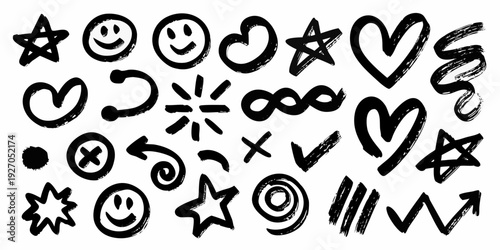 Black and white hand drawn doodles of stars hearts and smiley faces