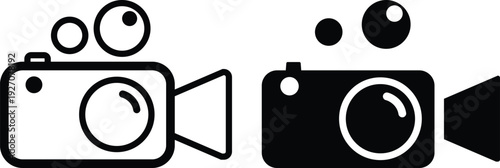 A comparison between a vintage film camera and a modern digital camera.