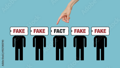 Fényképezés Hand placing Fact label on a digital person's head - Concept of misinformation a