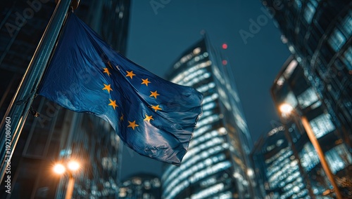European Union Flag Waving Against Modern City Skyline at Night.