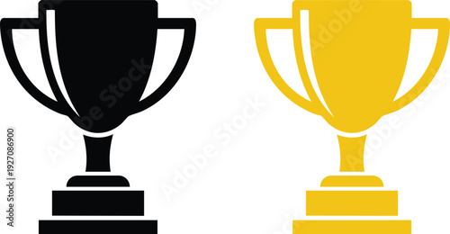Two golden trophies symbolizing victory and achievement in a competitive setting