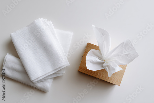 Wallpaper Mural Elegant white linens and tissue box on a serene table setting Torontodigital.ca