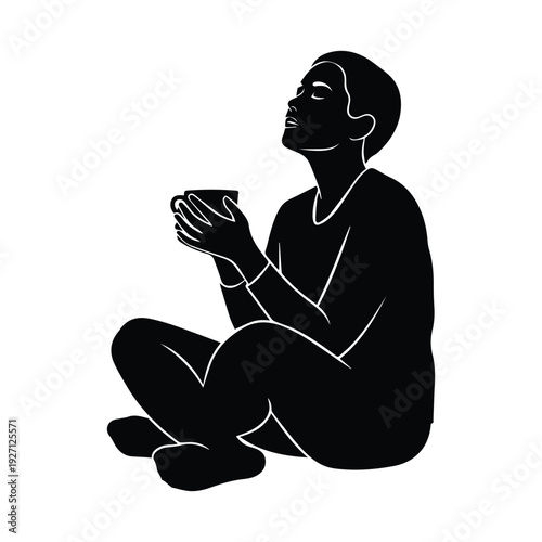 Serene woman sitting with cup in contemplative mood