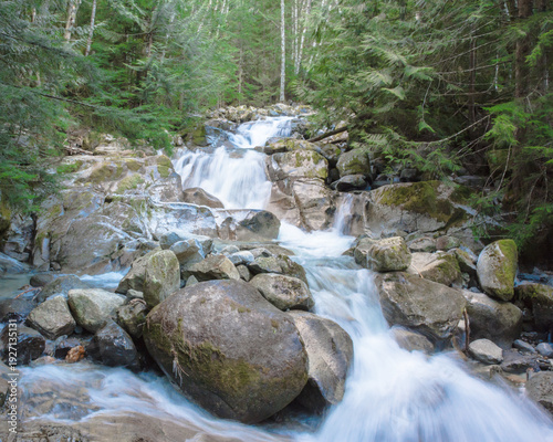 Rushing waterfall in forest near Annette Lake