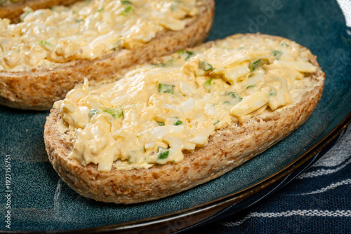 Breakfast sandwiches on plate.