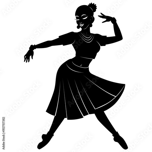 Silhouette of an Indian dancer in traditional attire on pointe shoes performing a graceful pose