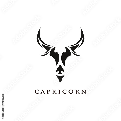 Tribal Capricorn zodiac sign logo, astrological symbol, dark silhouette on white background