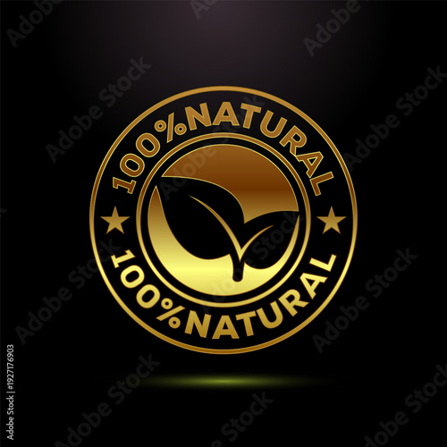 Golden one hundred percent natural label with leaf silhouettes for product care