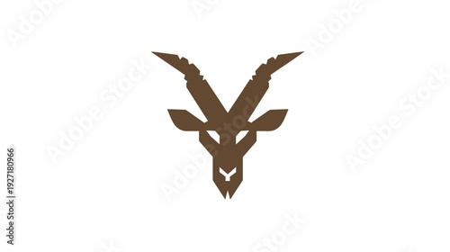 A geometric illustration features a brown silhouette of an animal head with large horns