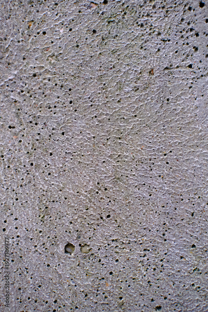 Fototapeta premium Gray concrete wall texture. Light green and pastel colors. Scratches, cracks and colored spots