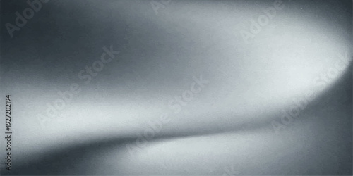 A shiny silver brushed metal texture background features a seamless metallic pattern on a gray stainless steel industrial surface for a modern chrome aluminum backdrop design