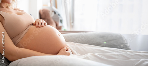 Canvas Print Closeup belly at third trimester