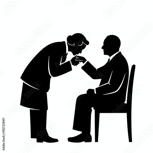 Solid black silhouette of a female bowing and kissing the hand of an elderly man on a chair as a sign of respect isolated on white background