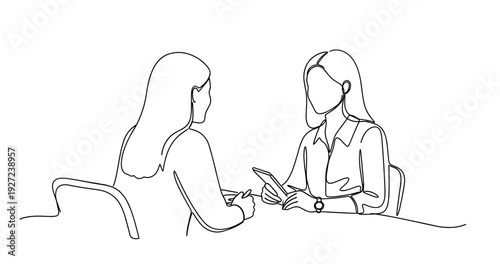Two women in business meeting with digital tablet discussion. No editable stroke