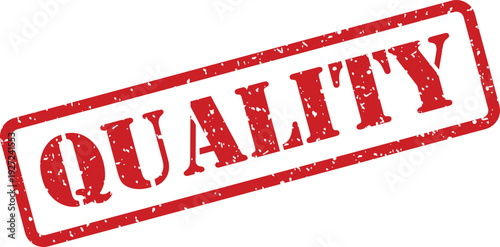 A distinguished red rectangular rubber stamp clearly showing the word QUALITY isolated on a clean white surface