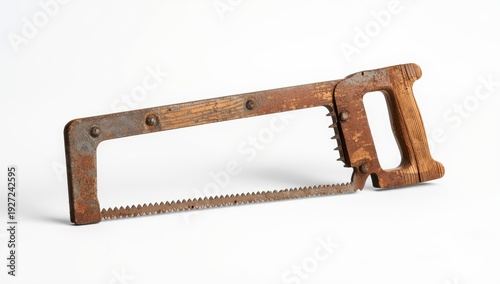 A worn-out hacksaw on a white backdrop