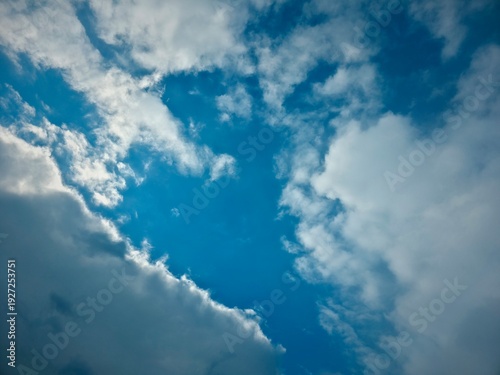 blue cinematic sky with white clouds