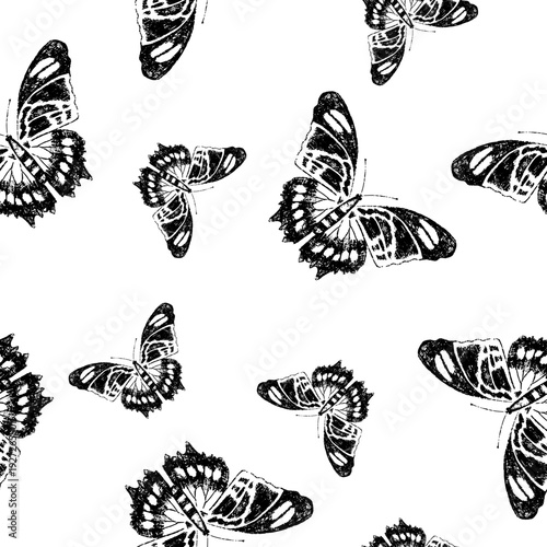 Фотография Vintage black and white butterfly all over seamless pattern in hand drawn engraved style