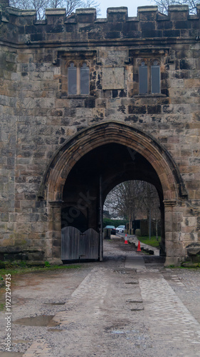 Whalley Abbey gatehouse. Stone gate to the old abbey. Open stone gate