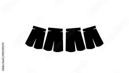 Vector illustration of four black shorts icons arranged in a slight arc, on a transparent background