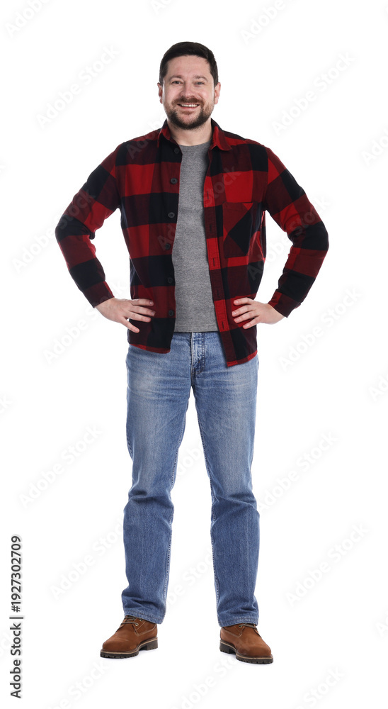 Fototapeta premium Smiling long-haul truck driver in red checkered shirt on white background