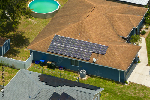 фотографія Photovoltaic solar panels on Florida home roof for producing clean ecological electric energy