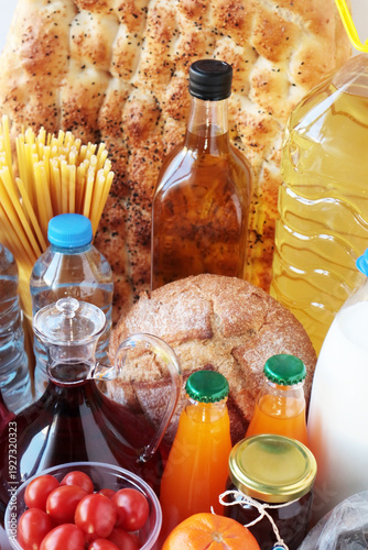 Uncooked, various foods were arranged in front of Traditional Ramadan Bread.Grocery shopping concept.