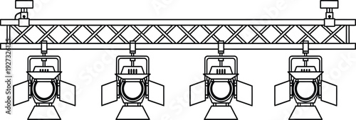Four stage lights mounted on a horizontal truss system for theatrical or concert lighting design