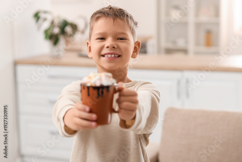 Cute little boy with cup of...