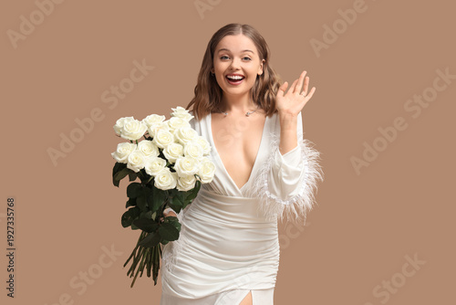 Beautiful happy young woman...