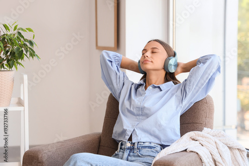 Young woman relaxing in arm...