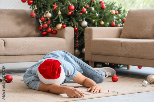 Drunk young man in Santa ha...