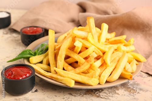 Plate with french fries, ba...