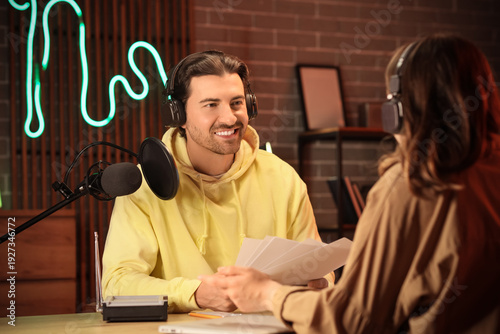 Male radio presenter with g...