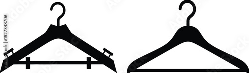 Two black clothing hangers on a for fashion or organization needs