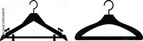 Two black plastic coat hangers with hooks on for clothing storage and organization