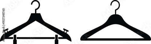 Two black plastic coat hangers with hooks on for hanging clothes