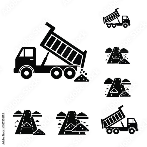 Black and white dump trucks and road construction warning signs