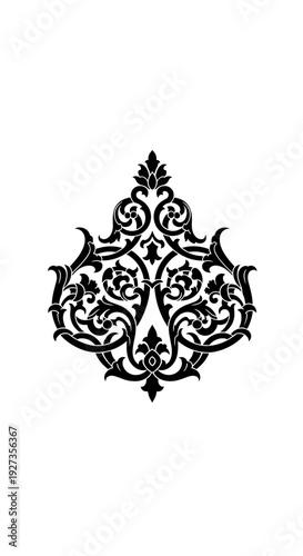 Black ornate decorative element with floral design.